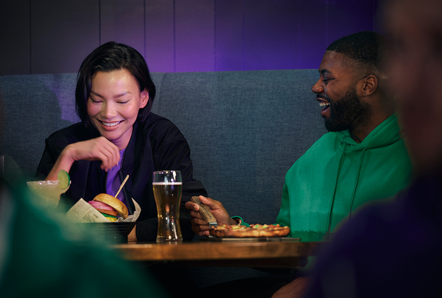 Couple dining & laughing