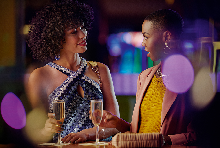 friends chatting at a bar