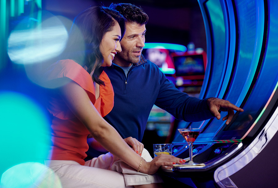 Couple playing Slots