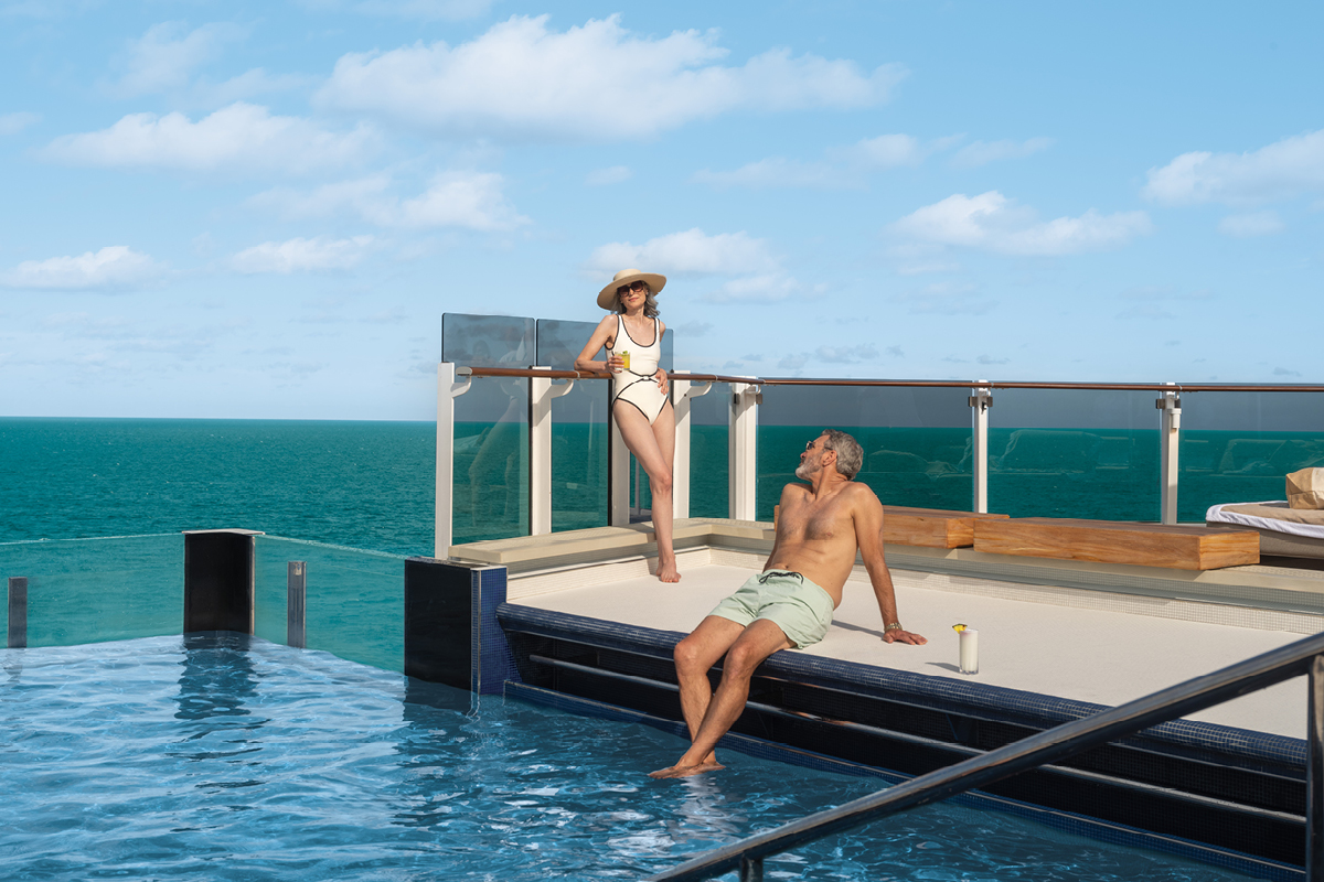 couple at pool on cruise
