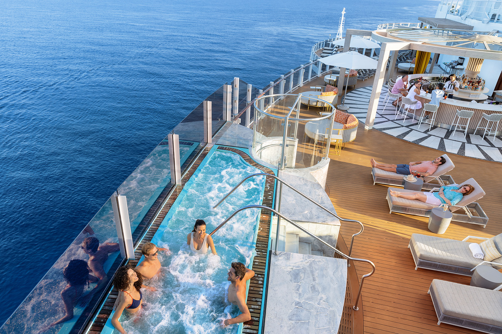 pool and loungers on cruise ship deck