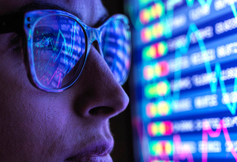 close-up of a person's face in front of screen