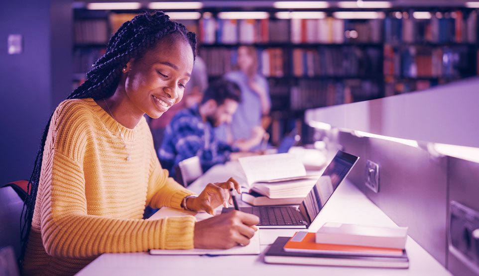 Woman studying in a library